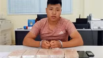 Bị bắt cùng 5 bánh heroin ở Lóng Luông