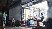 Bị điện giật tử vong khi sửa máy ép nhiệt ở kho vải