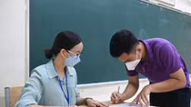 Ghi nhận tại một điểm trường làm thủ tục thi tốt nghiệp THPT