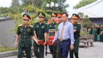 Long trọng lễ an táng 12 hài cốt liệt sĩ quân tình nguyện và chuyên gia Việt Nam hi sinh tại Lào