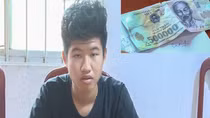 Dùng tiền giả đi mua hàng đổi lấy tiền thật