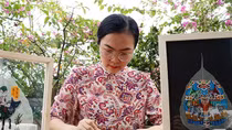 Người vẽ tranh trên lá