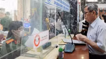 Tăng cường làm cả ngày nghỉ để cấp hộ chiếu phổ thông mẫu mới
