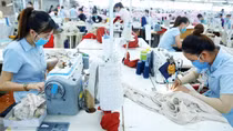 Người lao động phấn khởi trở lại làm việc sau Tết