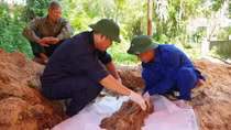 Cất bốc hài cốt liệt sỹ chưa rõ danh tính trong khu dân cư