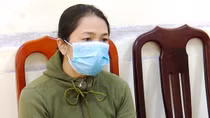 Người phụ nữ bị bắt cùng hơn trăm triệu đồng tiền đánh đề