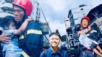 Gặp chiến sĩ trong bức ảnh bế cháu bé thoát khỏi đám cháy gây xúc động mạng xã hội