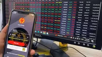 Chứng khoán chao đảo, VN-Index giảm gần 100 điểm
