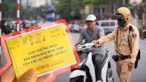 Không mang bảo hiểm bắt buộc, người điều khiển xe máy có thể bị phạt tiền