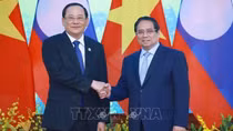 Thủ tướng Phạm Minh Chính gặp Thủ tướng Lào Sonexay Siphandone nhân Hội nghị thượng đỉnh P4G