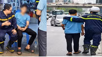 Ngăn chặn hành vi tiêu cực của nam thanh niên ngồi trên lan can cầu vượt