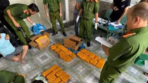 Thu giữ 1 khẩu súng trong đường dây vận chuyển 58kg ma túy
