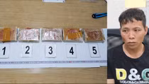 Ôm 5 bánh heroin đi “chơi đêm”