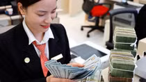 Thở phào vì tỷ giá "hạ nhiệt"