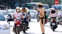 Nghiêm cấm cán bộ can thiệp công việc xử lý vi phạm trật tự an toàn giao thông