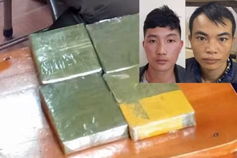 hai bị cáo phấu và minh cùng tang vật.jpg -0