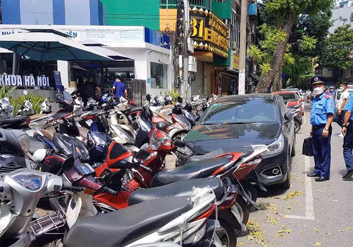 Hơn 400 bãi trông giữ xe vi phạm bị xử lý -0