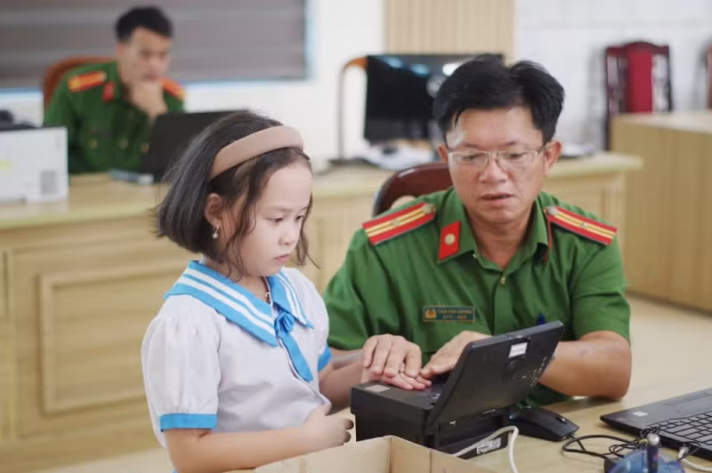Người dân được thụ hưởng nhiều tiện ích khi triển khai Luật Căn cước -0