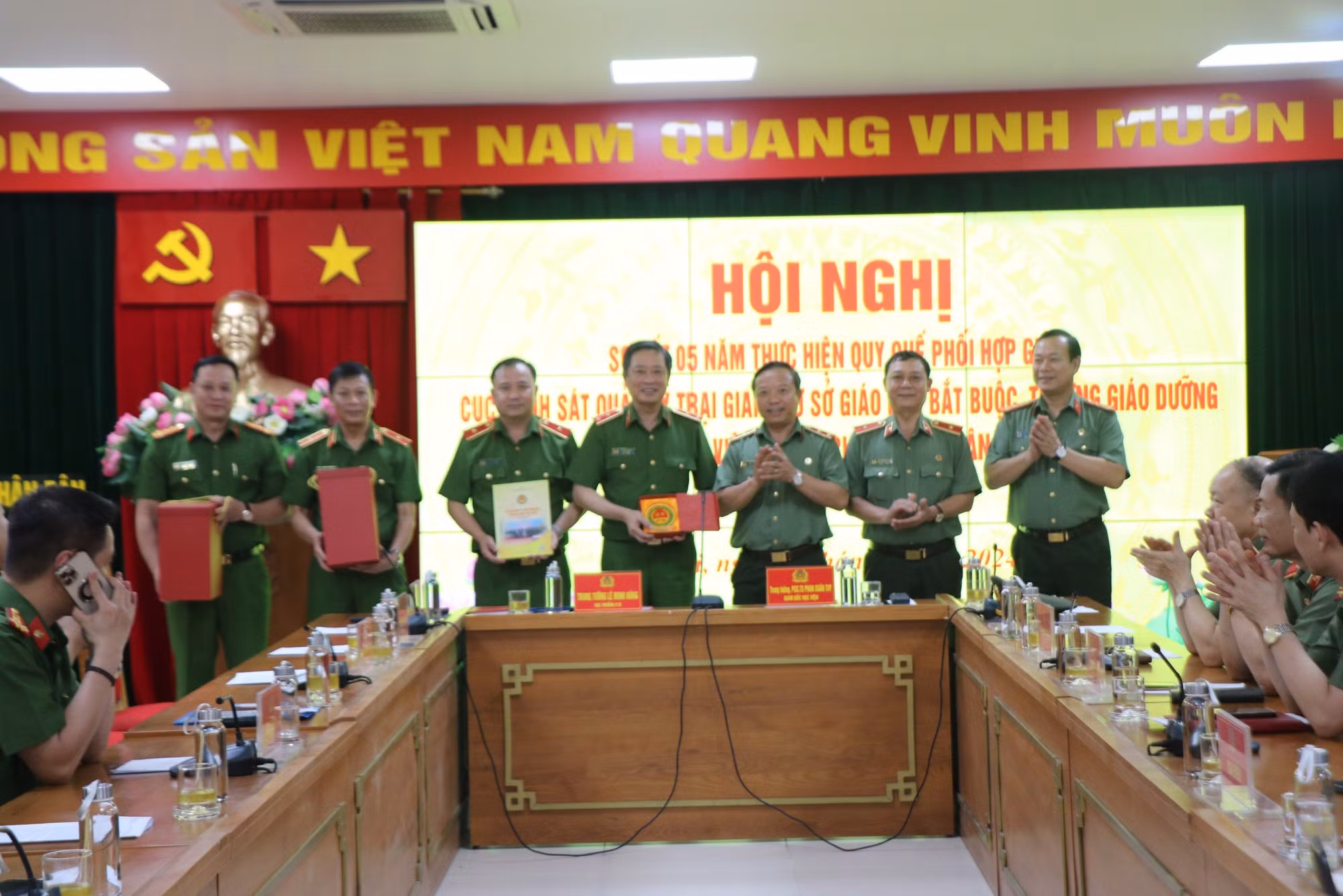Học viện Chính trị CAND và Cục Cảnh sát quản lý trại giam sơ kết 5 năm thực hiện quy chế phối hợp -0