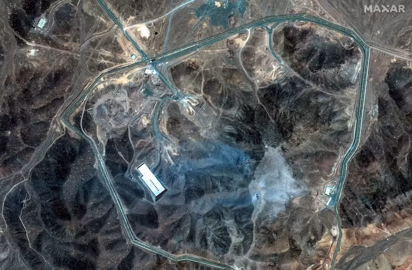 Iran bất ngờ tuyên bố ngừng làm giàu uranium -0