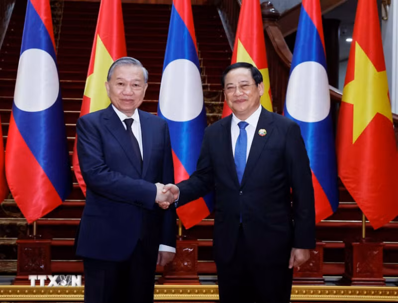 Chuyến thăm của Tổng Bí thư mở ra một chương mới, nâng tầm quan hệ Việt-Lào -0