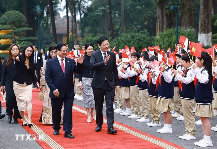 Thủ tướng Phạm Minh Chính chủ trì lễ đón Thủ tướng Singapore và Phu nhân -1