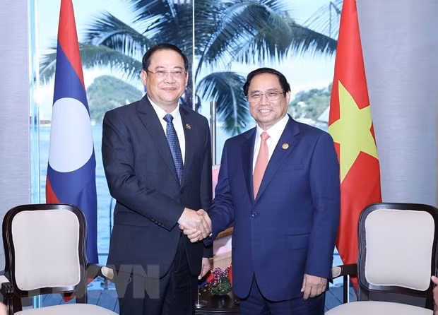 Thủ tướng Phạm Minh Chính gặp Thủ tướng Lào Sonexay Siphandone -0