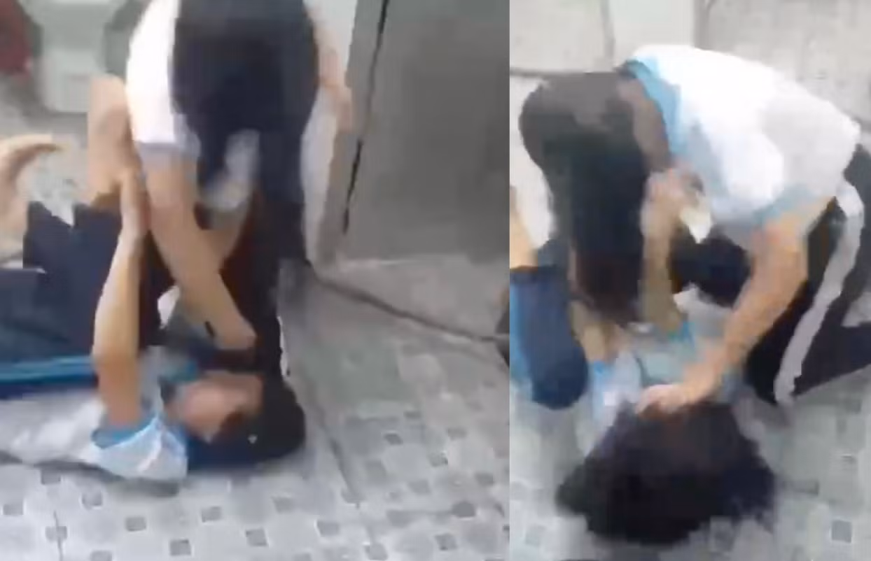 Kỷ luật 2 nữ sinh đánh nhau và những học sinh đứng xem -0