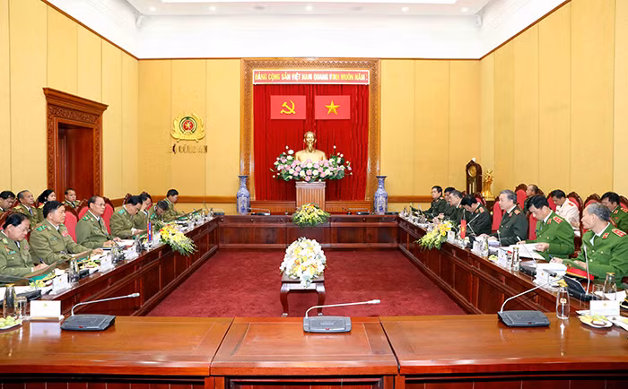 Đưa quan hệ hợp tác giữa hai Bộ Công an Việt - Lào lên tầm cao mới -0