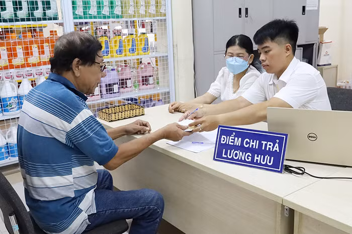 Đẩy mạnh chi trả các chế độ bảo hiểm không dùng tiền mặt -0