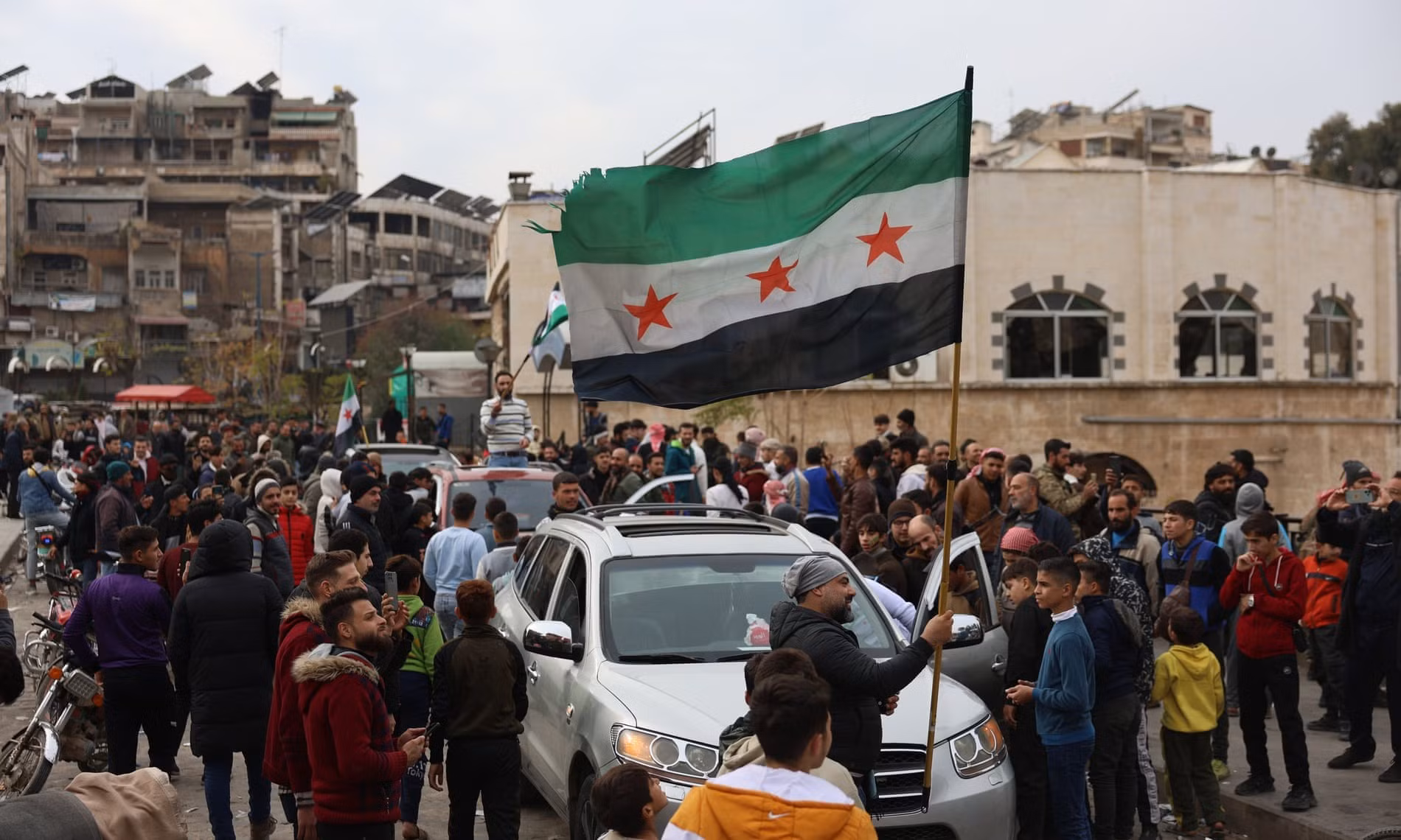Quá khứ gây tranh cãi của nhóm phiến quân vừa chiếm thủ đô Syria -0