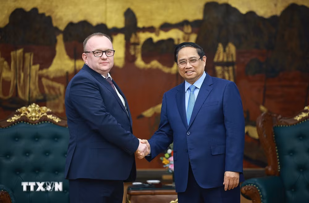 Thủ tướng Phạm Minh Chính tiếp Chủ tịch Ủy ban Giám định tư pháp Belarus và Giám đốc Đại học RMIT -0