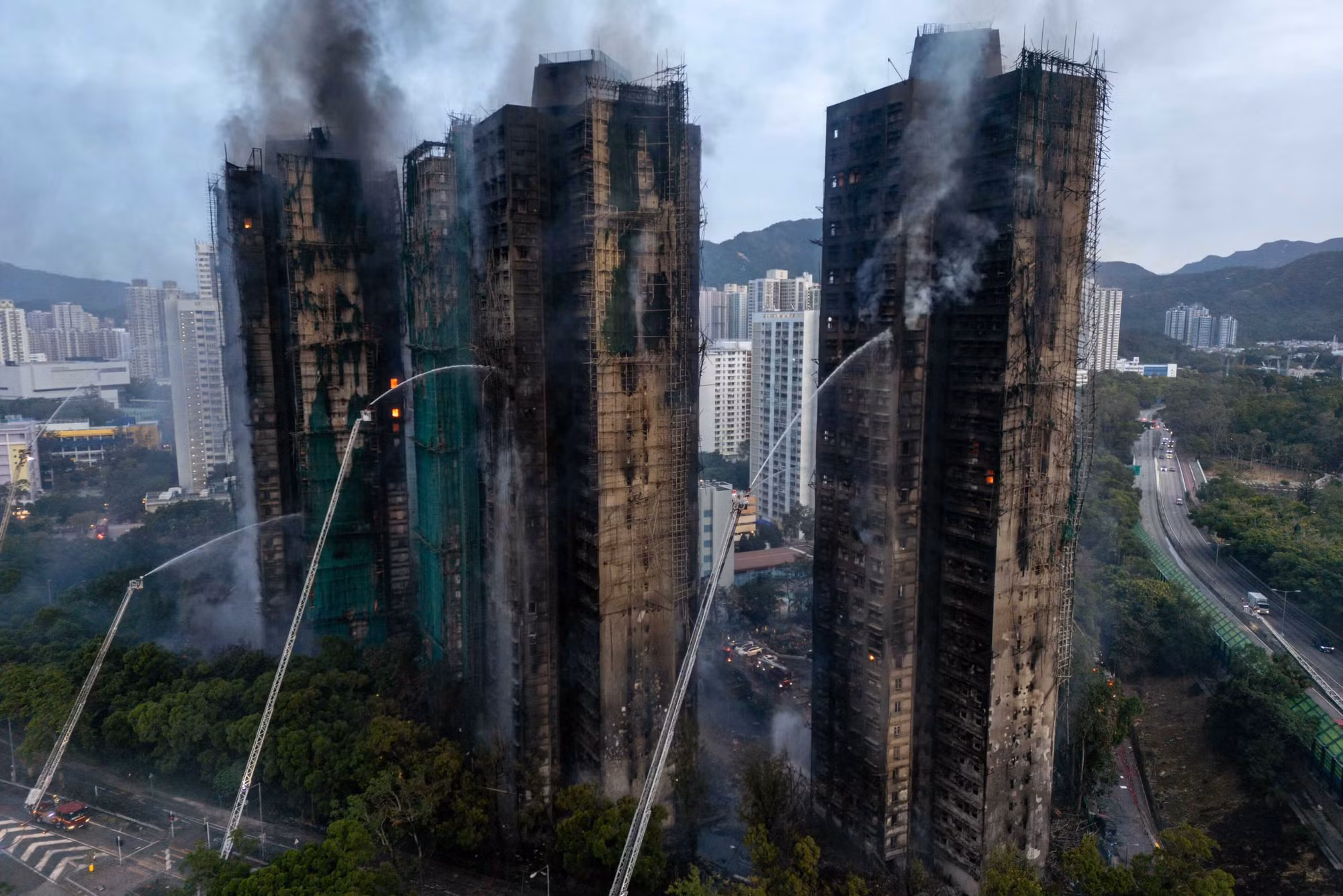 Điều chưa biết về tổ hợp chung cư trong thảm hoạ cháy tại Hong Kong -0