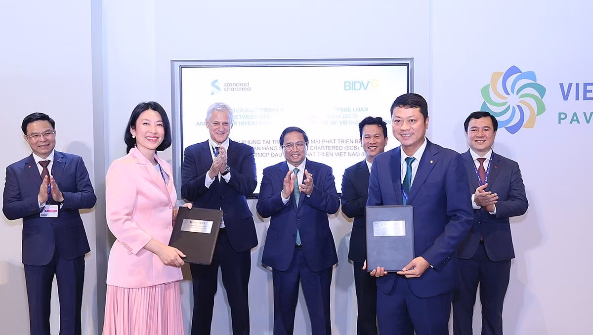 ảnh 2 bidv và standard chartered bank vn.jpg -1