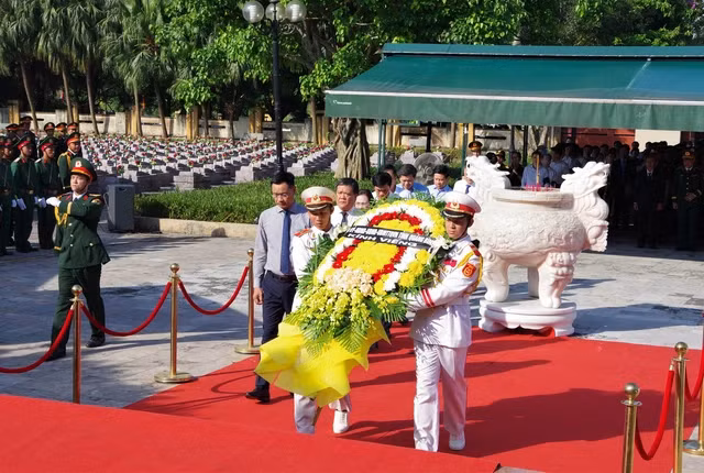 An táng 17 hài cốt liệt sĩ quân tình nguyện và chuyên gia Việt Nam hy sinh tại Lào -0