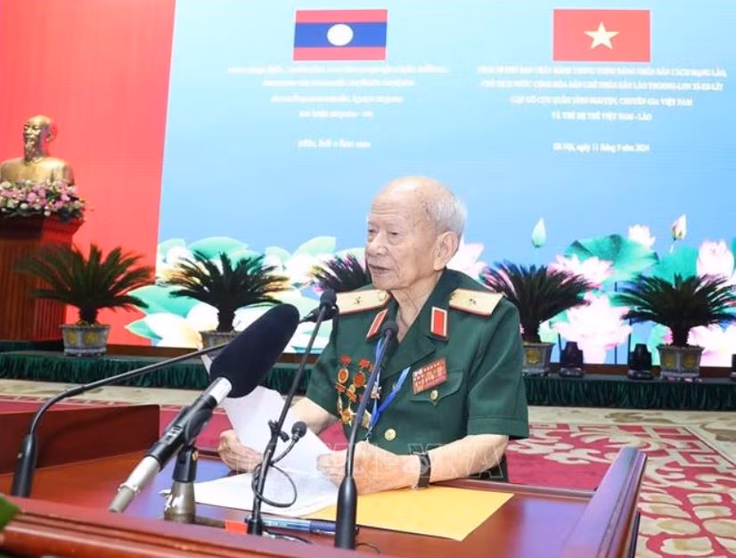 Tổng Bí thư, Chủ tịch nước Lào gặp gỡ cựu quân tình nguyện, chuyên gia, lưu học sinh Việt Nam tại Lào -0