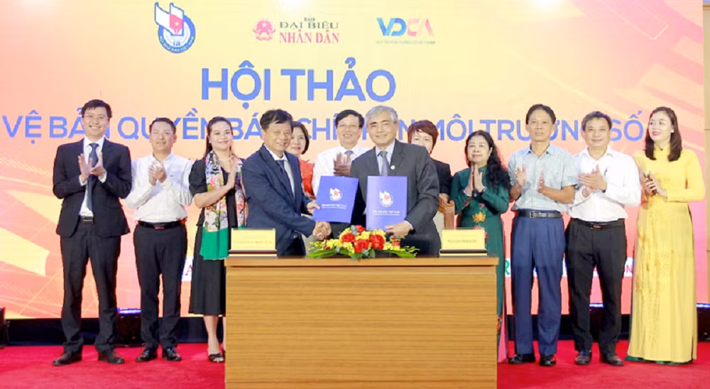 Cần sớm thành lập Trung tâm bảo vệ bản quyền báo chí -0
