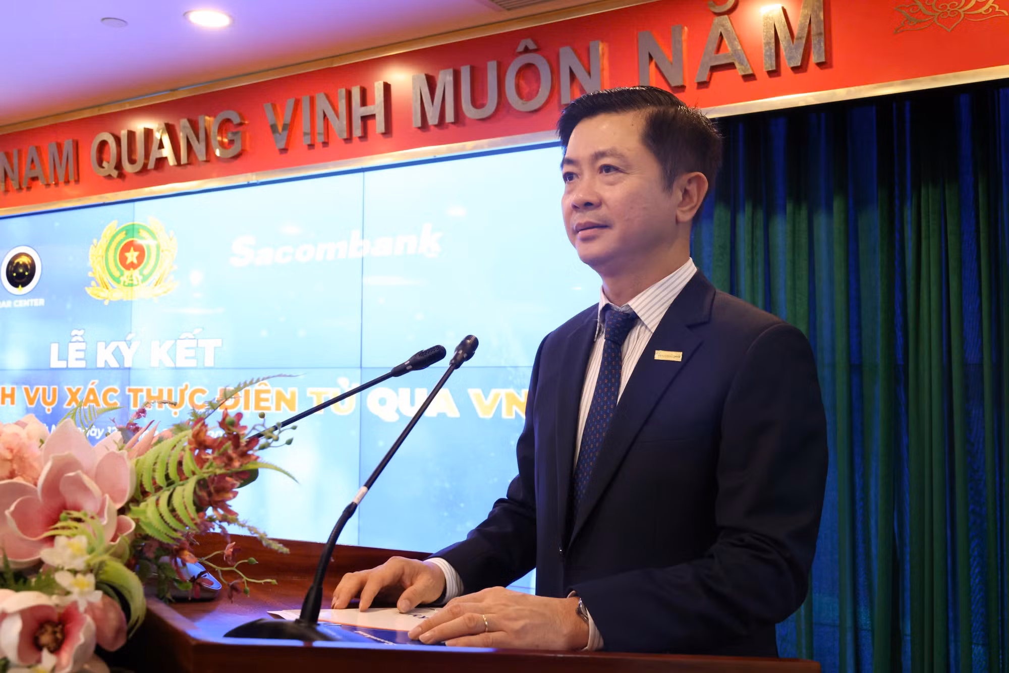 Lễ ký kết triển khai dịch vụ xác thực điện tử qua VNeID tại ngân hàng -0
