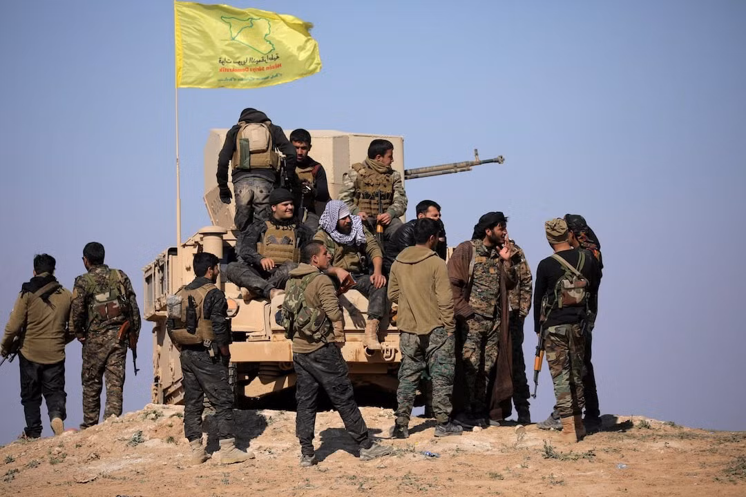 Người Kurd hợp lực với quân đội chính phủ mới ở Syria -0