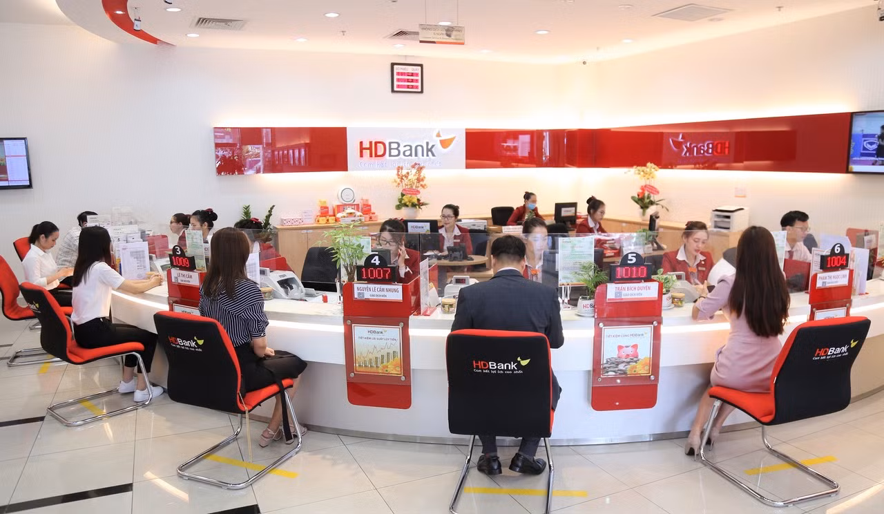 Ngân hàng đẩy mạnh giải ngân gói hỗ trợ lãi suất 40.000 tỷ -0