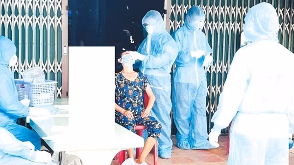 Chỉ còn một quận ở TP Hồ Chí Minh thuộc "vùng cam" ảnh 3
