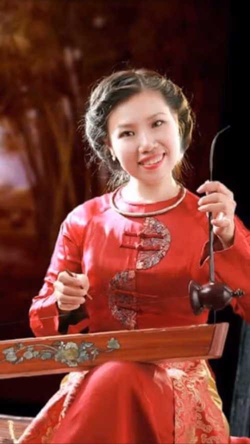ns đàn bầu nương chiều (ao do)).jpg -0