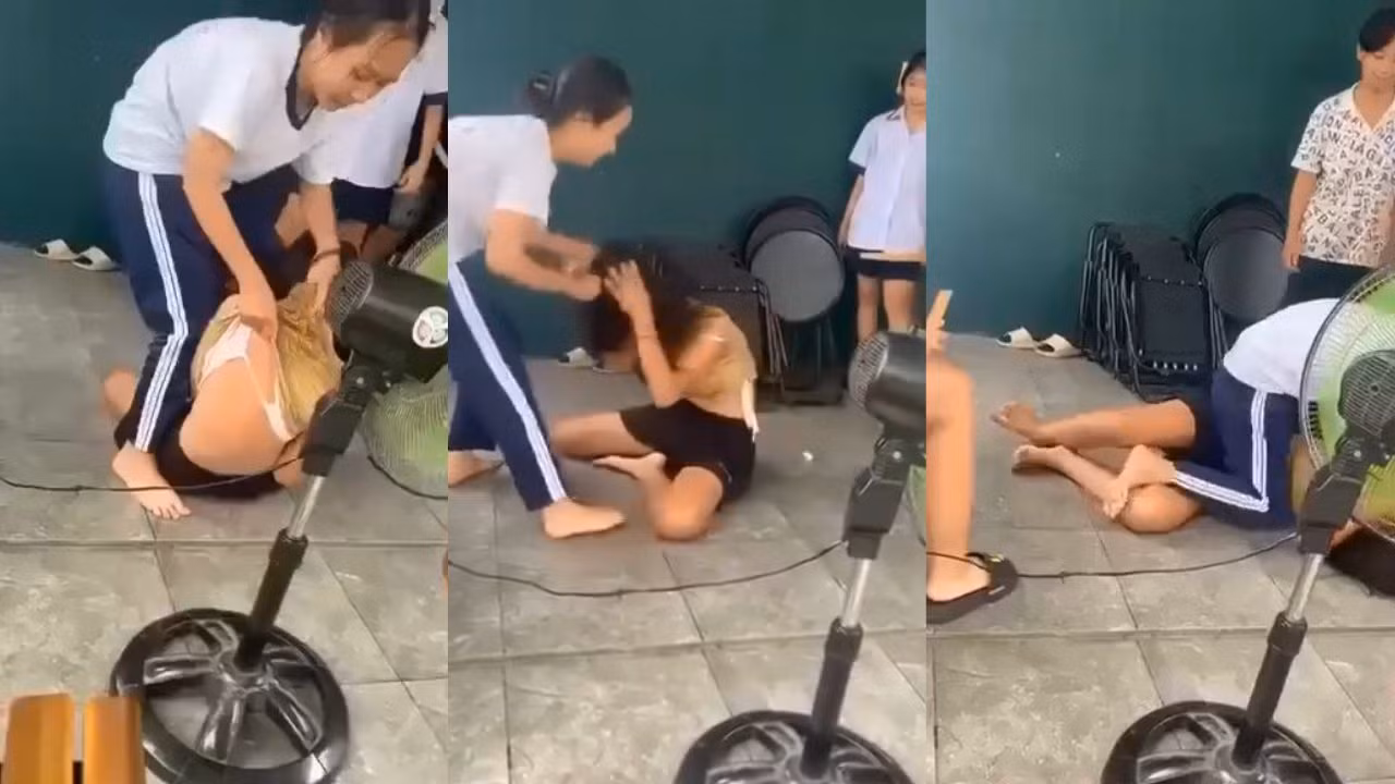 Nữ sinh ở TP Hồ Chí Minh đánh và xé áo bạn -0