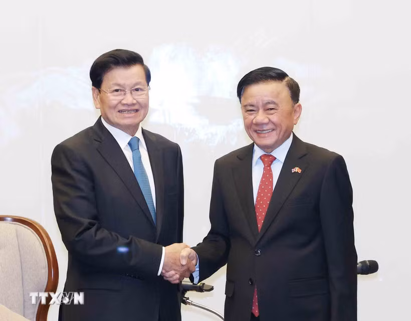 Thường trực Ban Bí thư chủ trì tiễn Tổng Bí thư, Chủ tịch nước Lào và Phu nhân -0