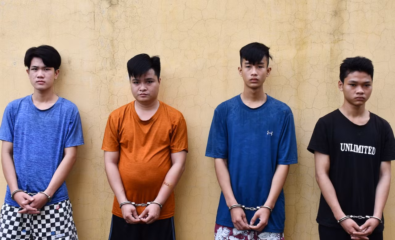 nhựt, trương, nhân, lân tại cơ quan điều tra ( từ trái qua). ảnh hồ sương.jpg -0