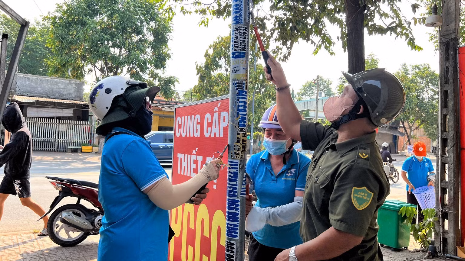 TP Hồ Chí Minh: Đồng loạt ra quân cao điểm bóc xóa quảng cáo sai quy định -2