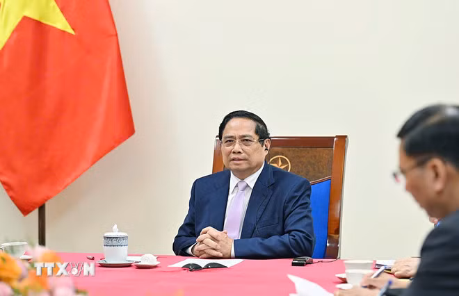 Thủ tướng Phạm Minh Chính điện đàm với Thủ tướng Malaysia Anwar Ibrahim -0