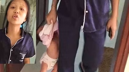 Xác minh thông tin người phụ nữ trẻ xách cháu bé vài tháng tuổi