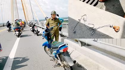 Dựng xe trên cầu rồi nhảy xuống sông