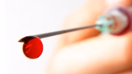 Dùng kim tiêm dọa lây truyền HIV cướp tài sản của phụ nữ